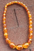 Huge yellow (amber?) looking necklace