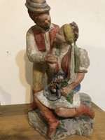 Szécs pottery, a loving couple in folk costume. Indicated.