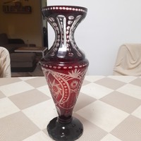 The purple stained polished vase is 31 cm high