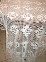 Beautiful white hand crocheted floral lace tablecloth