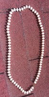 String of pearls necklace with mother-of-pearl shine