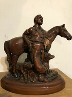 Equestrian statue. Allen Davey, a New Zealand artist. Cowboy with horse.