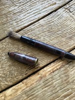An old fountain pen-shaped brush