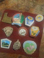 A collection of tourist badges from 1960