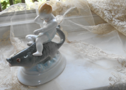 Herend white display case figure - putto on top of a fish
