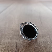 Old silver ring with onyx stone