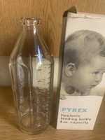 Old glass baby bottle
