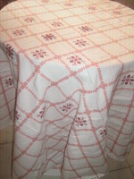 Beautiful cross-stitch hand-embroidered woven tablecloth with a lace edge
