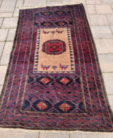 Hand-knotted Afghan Baluch nomadic rug. Negotiable.