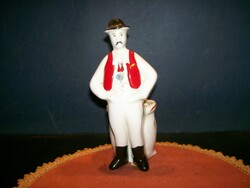 Porcelain figurine from Kalocsa is 15 cm high
