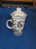 Oriental tea cup with filter and lid