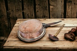 Antique copper pan and copper ladle