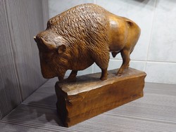Wood carved bison, sole