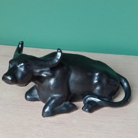 Ceramic reclining buffalo figure