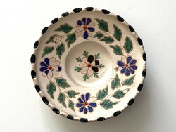 Incised painted blue floral green leaf glazed ceramic folk wall plate