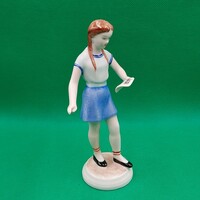 Porcelain figurine of a singing girl from Ravenclaw House