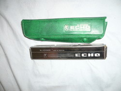 Hohner echo harmonica with case
