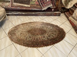 Exclusive handmade ghom oval silk Persian rug