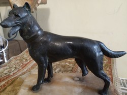 Bronze statue depicting a dog (perhaps a Great Dane?).