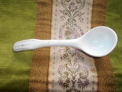 Antique porcelain spoon for sauce dish
