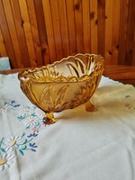 Amber colored glass table centerpiece, offering