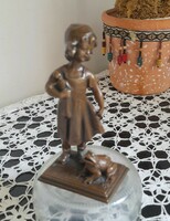Little girl with a frog, metal statue
