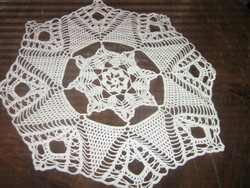 Beautiful snow-white antique hand-crocheted round octagonal tablecloth