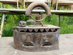 Old iron with lion's head