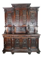Antique, freshly renovated, renaissance-style richly carved sideboard