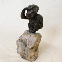 Bronze monkey on a marble plinth