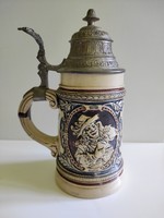 Antique beer mug with lid