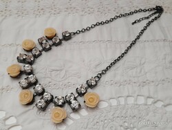 Rhinestone, rose necklace, in a vintage atmosphere