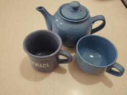Blue ceramic teapot with mug