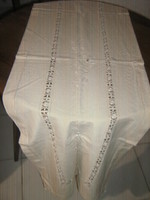 Beautiful ecru runner with floral lace tablecloth
