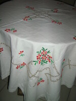 Beautiful hand-embroidered floral white linen tablecloth