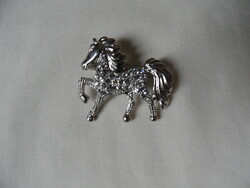 Silver colored horse badge, brooch