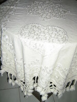 Beautifully stitched written pom-pom fringed woven tablecloth