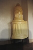 Round antique tiled stove