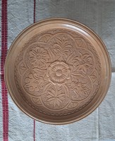 Hand-carved folk motif cake plate offering
