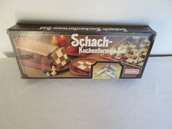 Old, checkerboard cake baking tin in its original box. Negotiable!