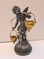 Antique tin winged Cupid figurine sculpture from 1860-1890