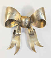 Antique silver bow