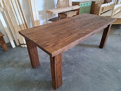 Table made from reclaimed material in rustic style