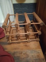 Wooden wine holder 34 cm high and 24 cm long. A great piece for your home