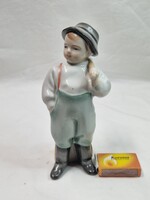 Sinkó András tervezte Zsolnay pajzspecsétes korsós fiú porcelán figura hibátlan állapotban 19,5 cm.