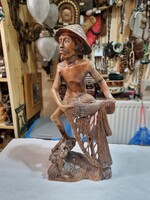 Régi keleti fa faragott figura