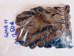 Gomb 11-3 - négylyukú 22,8x3,8mm 250db egyben 280g műanyag