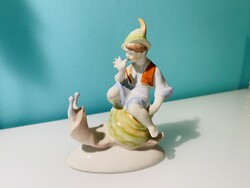 Hollóházi csigán lovagló fiú porcelán figura
