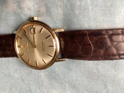 Omega Automata Seamaster tömör arany lünettás karóra