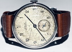 1943-as Doxa cal.1 legendás szerkezetes kiváló működéssel új krómozású tokkal.  35 mm k.n. Új barna